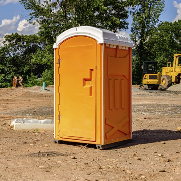 what is the cost difference between standard and deluxe portable toilet rentals in Goshen County